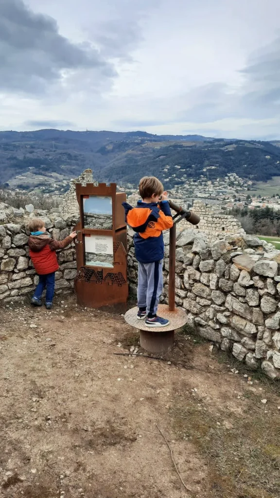 Children using the equipment at Crussol castle in winter